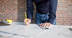 Hands, man and engineer writing with blueprint, drawing and sketch for building design. Person, measurement and document with ruler, construction illustration and architecture structure for expansion