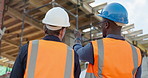 Construction, team and site inspection with blueprint for masonry, structure integrity and back. Men, architect or pointing with floor plan for renovation progress, code compliance or building safety
