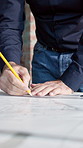 Architecture, drawing and hands of man with blueprint, design and layout for building project. Engineer, contractor and person with sketch, pencil and ruler for floor plan, remodeling and renovation