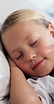Rest, sleeping and child on bed in hospital with teddy bear for comfort on operation, surgery or recovery. Relax, medical checkup and girl patient with plush toy in ward for rehabilitation in clinic.