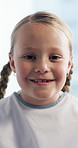 Face, patient or happy girl with teeth in hospital for dental appointment, treatment or oral care. Portrait, child or kid with smile for dentist procedure, gum healthcare or medical service in clinic