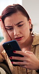 Phone, confused and woman in home, reading text or spam email with phishing link on internet. Mobile, stress and person in house with scam message, website glitch and online error for bad news