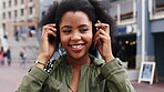 Headphones, smile and dance with black woman in city for streaming service, music and connection. Audio subscription, energy and media app with person listening outdoor for sound, radio and playlist