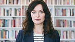 Professional, face and business woman in library for publishing agency, author representative and creative. Literary agent, book editor and confidence with person in startup for pride and bookshelf