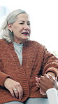 Holding hands, nurse and senior woman in house with comfort, conversation or medical support. Happy, healthcare and caregiver with elderly female person in retirement for checkup in nursing home.