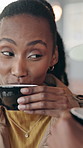 Flirt, happy and woman in coffee shop for dating, bonding and playful relationship with wink. Restaurant, laugh and couple with drink, beverage and communication for love, connection and romance