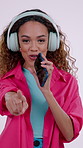 Face, singing and woman on a white background with headphones, audio and streaming subscription. Dance, portrait and person with lyrics, movement and happy with music, playlist and song in studio