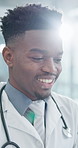 Black man, thinking and doctor with smile at hospital with insight, talking and inspiration on break. Person, perspective and healthcare professional with reflection, decision and choice at clinic