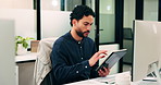 Man, typing or research in office with tablet, update software or problem solving for web development. Programmer, person and review digital project in business with tech, connectivity and site test.