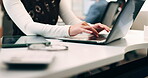 Hands, laptop and typing with business person at desk in workplace for planning or research. Computer, keyboard and report with employee woman in coworking office for agenda, review or schedule