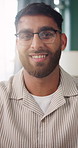 Face, man and laptop in home with remote work, glasses and experience for digital marketing career. Happy, person and freelancer in house with advertising job, computer and creativity for employment.