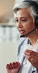 Woman, doctor and pills in office with headset, consultation and medical advice for prescription. Mature person, consulting and workplace with medicine, instructions and telehealth for side effects