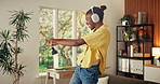 Music, dance and excited black woman in home with energy, streaming service and favorite song. Headphones, happy person and moving with rhythm, radio or listening to audio for freedom on weekend