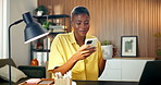 Black woman, coffee and phone in house with laughing for online joke, funny meme or humor on social media. Happy female person, mobile app or network with drinking tea at home with comedy website