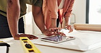 Moving, tablet and hands of couple in new home with plans for renovation and interior designing. Real estate, mortgage and people with digital tech for ecommerce purchase and apartment checklist