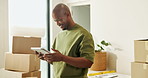 Tablet, smile and black man in new home with moving for online search, planning or furniture order. Digital tech, problem solving and person with ideas for living room renovation and website info