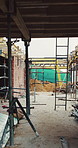 Layout, scaffolding and empty site for construction, foundation and exterior framework. Building, wooden beam and brick wall for structure support, urban development and civil engineering for project