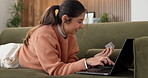 Laptop, excited and woman on sofa with credit card, online shopping and purchase on website store. Happy, home and person on computer for digital banking, payment and transaction for ecommerce order