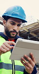 Tablet, man and typing on construction site with developer for building, renovation project or repairs. Safety, feedback and civil engineer with digital tech for inspection update or risk assessment