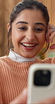 Phone, video call and woman in home with chat, greeting and online conversation or gossip. Happy, communication and female person with tech for virtual discussion with networking in living room
