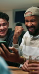 Friends, fish pump and phone at pub for soccer, live stream and winning team of world cup contest. People, cheering and esport with mobile app, football game and celebration for sports success at bar