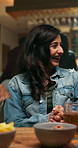 Pub, woman and talking with friends, laugh and socializing with communication for connection at night. Restaurant, happy person and conversation for story, weekend hangout and funny joke with humor