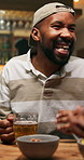 Pub, man and laugh with friends, beer and social gathering on reunion for communication at night. Restaurant, happy person and conversation for story with alcohol, hangout or funny joke with bokeh