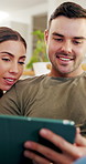 Couple, smile and relax with tablet in lounge, streaming or bonding with partner on weekend in house. Happy people, online and watching movies with app subscription, laughing and funny video in home
