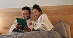 Couple, laugh and rest in hotel room with tablet, social media joke or planning for vacation at night. Late, happy married people and relax in accommodation bed with tech, meme and holiday discussion