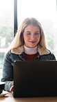 Creative, writer and woman with laptop in coffee shop, freelance or planning for article publication. Editing, blog post and happy person with technology, remote work and story development in cafe