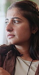 Sad, reflection and worry with woman on sofa in home for regret, grief memory and thinking. Mental health, trauma and disappointment with person with depression in living room of apartment with fear