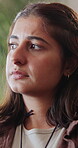 Sad, thinking and regret with woman on sofa in home for worry, grief memory and reflection. Mental health, trauma and disappointment with person with depression in living room of apartment with fear