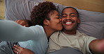 Selfie, smile and face of couple on bed for memory, bonding or social media post for anniversary. Kiss, portrait and black man with woman for photography picture in hotel for connection in marriage.