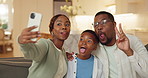 Family, funny face and selfie with child in lounge, black people and memory with son on social media. Parents, laughing or bonding with kid in living room, silly and profile picture with boy in house