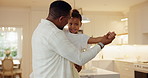 Dancing, happy and father with child in kitchen for bonding, love and connection with music or radio. Smile, teaching and black man with girl kid for moving to playlist on weekend together in house.