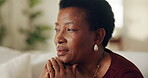 Black woman, senior and thinking on couch at house, contemplating or daydreaming with wonder. Female person, mature and perspective, nostalgia or remember with memory, insight or reflection at home