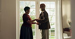 Love, tender or old couple in house with dance, romantic moment or bonding on weekend break. Laughing, groove or senior people with holding hands, rhythm or fun connection in healthy relationship.