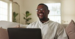 Businessman, laugh and video call in home with laptop, remote work or funny joke with financial advisor. Happy, black person and talk in house with computer, online meeting or humor for finance plan.