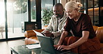 Finance, documents and happy couple with laptop in home for budget planning or expenses together. Interracial relationship, man and woman with computer for financial report, tax or analysis in house