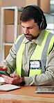 Man, logistics and headphones in warehouse with phone, browsing and streaming music for delivery. Smile, mature person and dance at storage with notebook, listen to podcast and ecommerce distribution