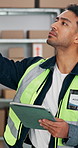Businessman, logistics and checking inventory with tablet for shipping, distribution or storage. Man, employee or counting stock with technology for supply chain, quality assurance or small business