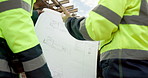 Hands, engineers and blueprint on construction site for planning, explain design or renovation ideas. Men, project team and floorplan at worksite for urban development, collab or infrastructure check