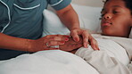 Family, holding hands and parent with sick child in bedroom, health check and concern for son on bed. Childcare, home and person with empathy for black kid, help and support for boy with flu symptoms