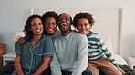 Love, support and black family on bed with face, security or bonding together on day off. Smile, parents or children in house with portrait, happy moment or caring relationship on weekend break.