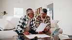 Budget, documents and tablet with old couple in home living room for finance or wealth management. App, paperwork and review with senior people in apartment for accounting, banking or tax assessment