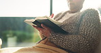 Senior, hands or woman reading with bible for literature, scripture or knowledge in retirement home. Elderly, female person or pages with holy book for faith, religion or belief in old age house