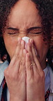 Sick, tissue and woman in house with blowing nose, flu season and illness symptoms with hayfever. Health, sinus issue and person in home with paper napkin, germ infection and sneeze with allergies.