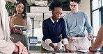 Documents, discussion and business people in office with review, feedback or update on revenue growth. Paperwork, meeting and team of financial advisors in collaboration for investment report.