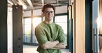 Face, creative or happy man with confidence in office for company design or improvement. Portrait, male person or designer with smile or arms crossed for career, service or development in workplace