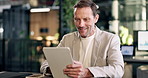 Tablet, happy and businessman in office with research for revenue growth on investment report. Reading, technology and mature financial advisor with email feedback on finance risk management on app.
